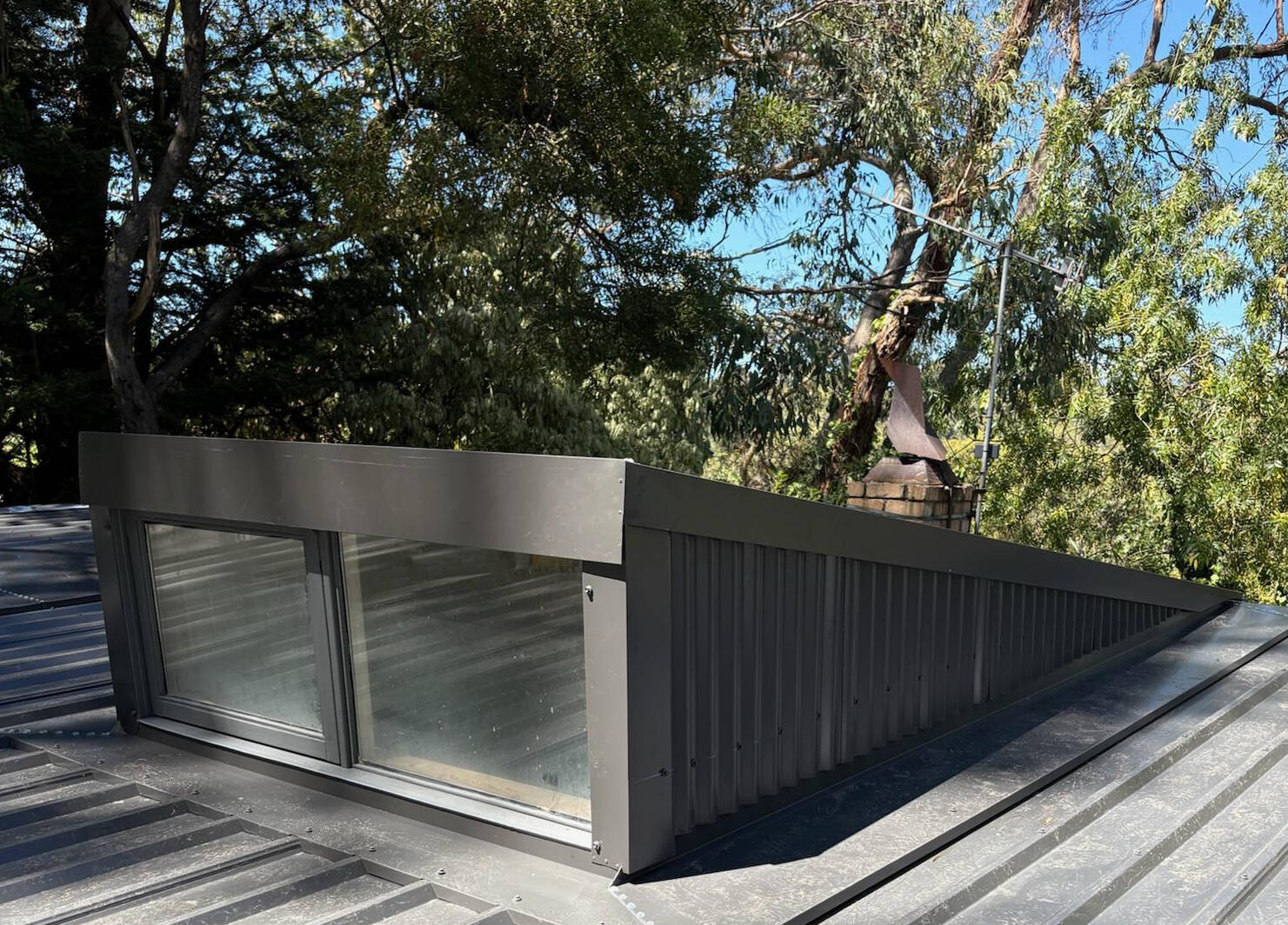 Re-fresh of old cement weatherboards & cladded with corrugated iron